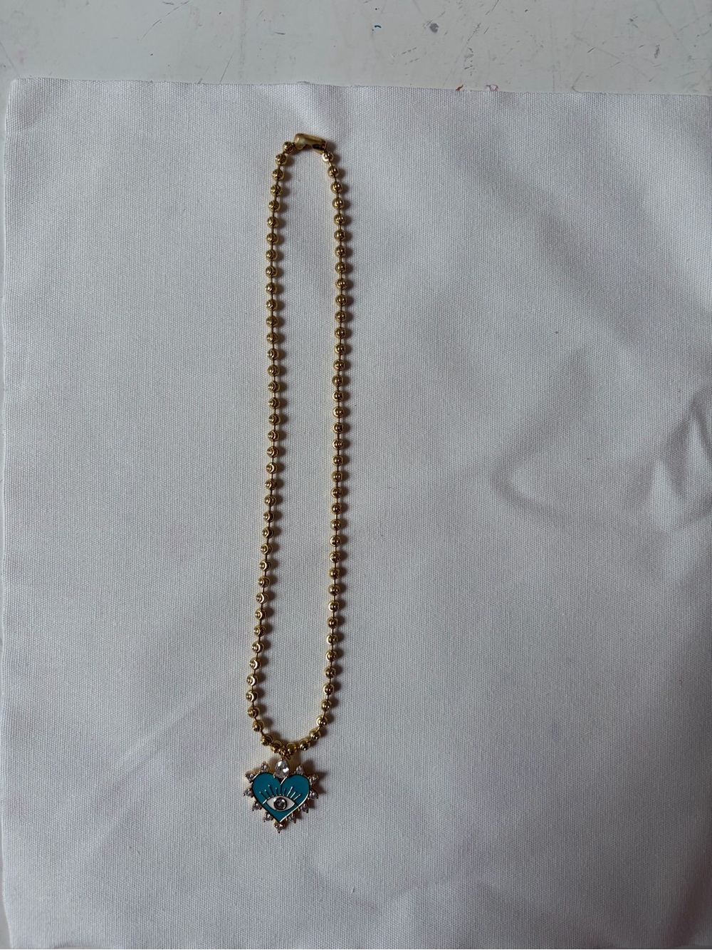 Gold-Tone Beaded Necklace with Turquoise Heart Pendant
